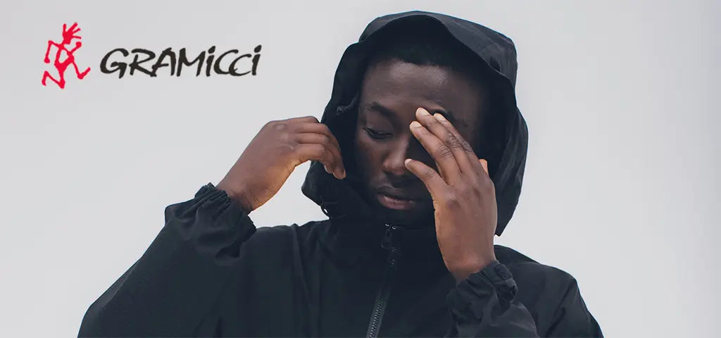 Man Wearing Hooded Gramicci Outerwear