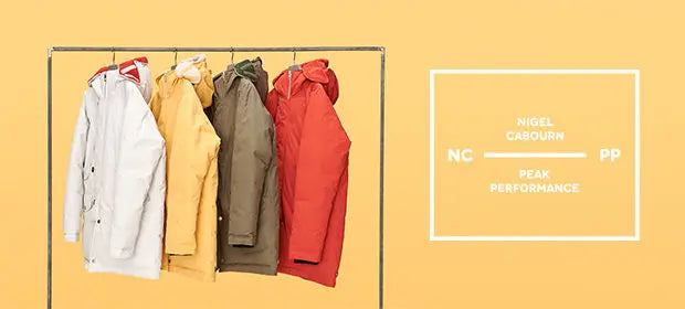 Nigel Cabourn x Peak Performance Jackets Hanging on Coat Rack